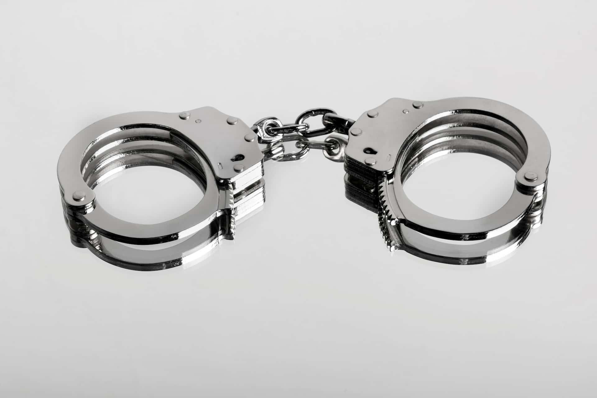 handcuffs await a person with a DUI Conviction in NH